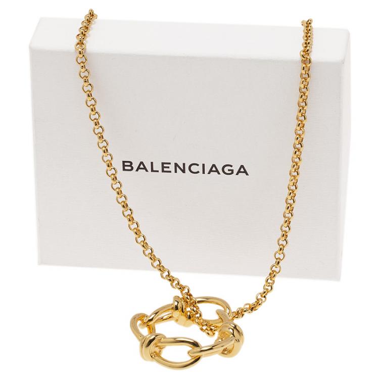 Pre Owned Balenciaga Continuity Bow Round Pendant Gold Tone Necklace
