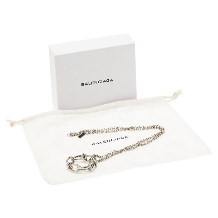 Pre Owned Balenciaga Continuity Bow Round Pendant Silver Tone Necklace