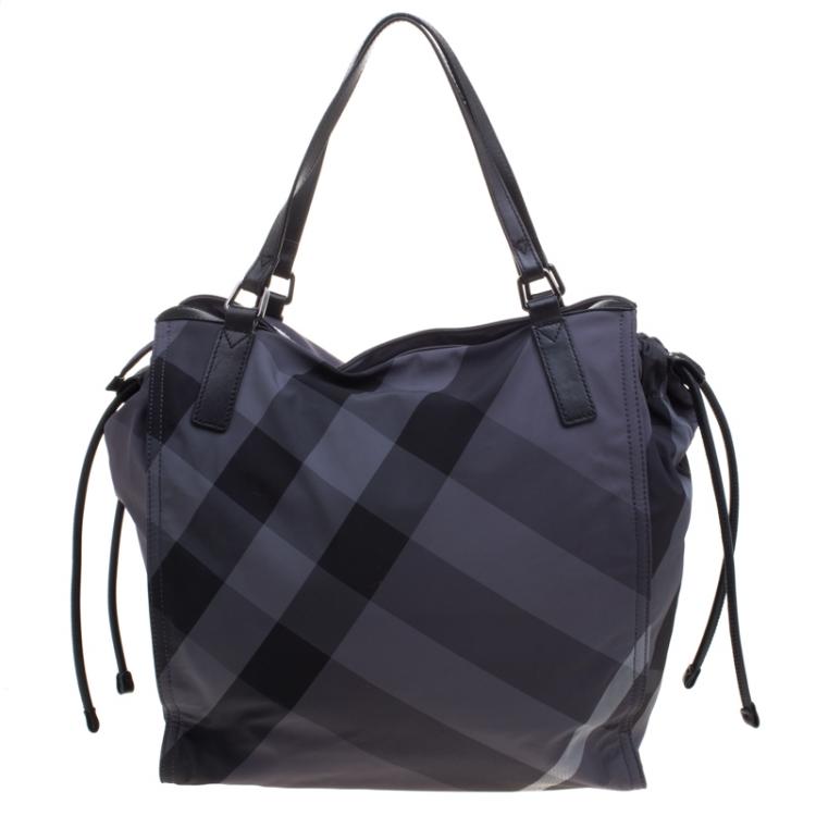 Pre Owned Burberry Black Beat Check Nylon Drawstring Tote