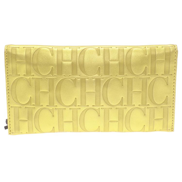 Pre Owned Carolina Herrera Gold Monogram Leather Tassel Clutch