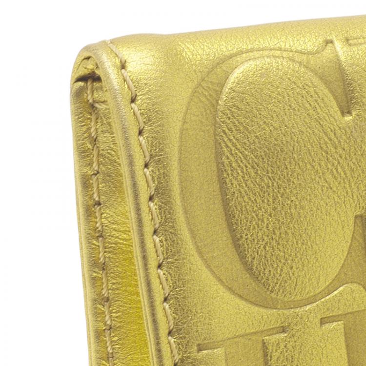 Pre Owned Carolina Herrera Gold Monogram Leather Tassel Clutch