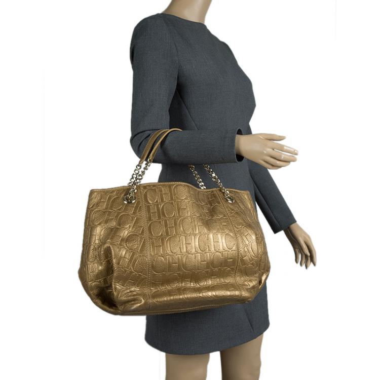 Pre Owned Carolina Herrera Gold Monogram Embossed Leather Dahlia Hobo