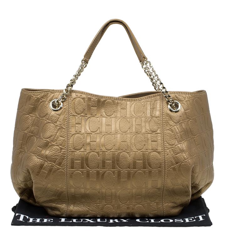 Pre Owned Carolina Herrera Gold Monogram Embossed Leather Dahlia Hobo