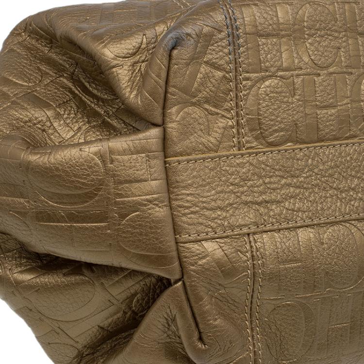 Pre Owned Carolina Herrera Gold Monogram Embossed Leather Dahlia Hobo