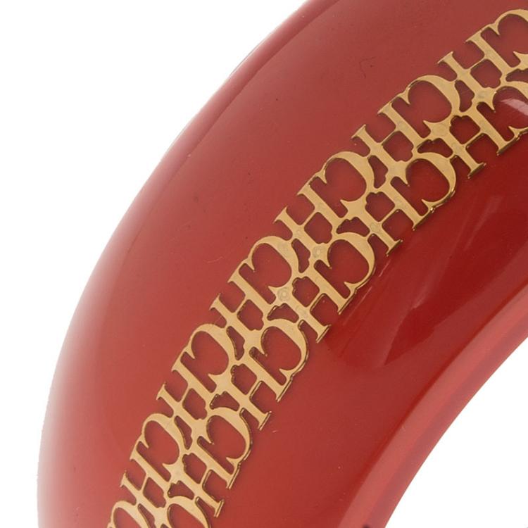 Pre Owned CH Carolina Herrera Red Resin Gold Tone Metal Wide Bangle 21cm