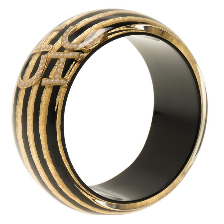 Pre Owned CH Carolina Herrera Black and Gold Resin Bangle Bracelet