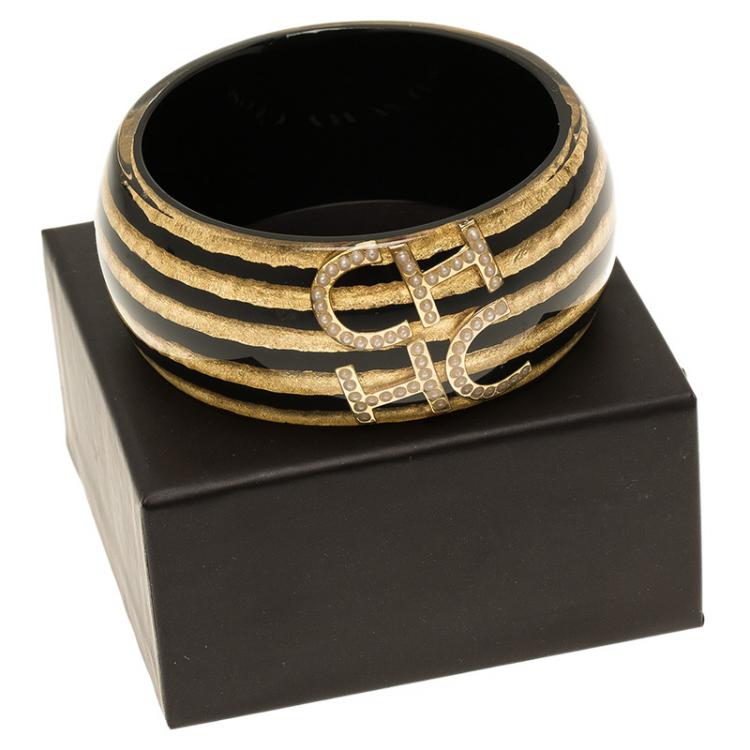 Pre Owned CH Carolina Herrera Black and Gold Resin Bangle Bracelet
