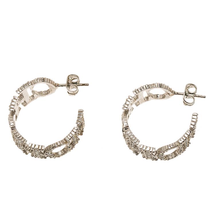 Pre Owned CH Carolina Herrera Crystal Studded Logo Silver Tone Earrings