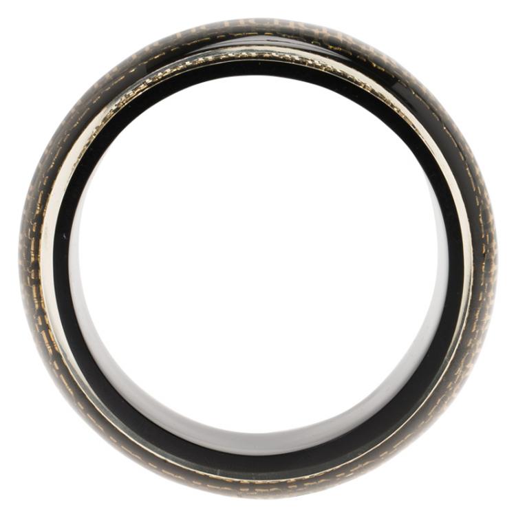 Pre Owned CH Carolina Herrera Black Resin Gold Tone Metal Wide Bangle 20cm