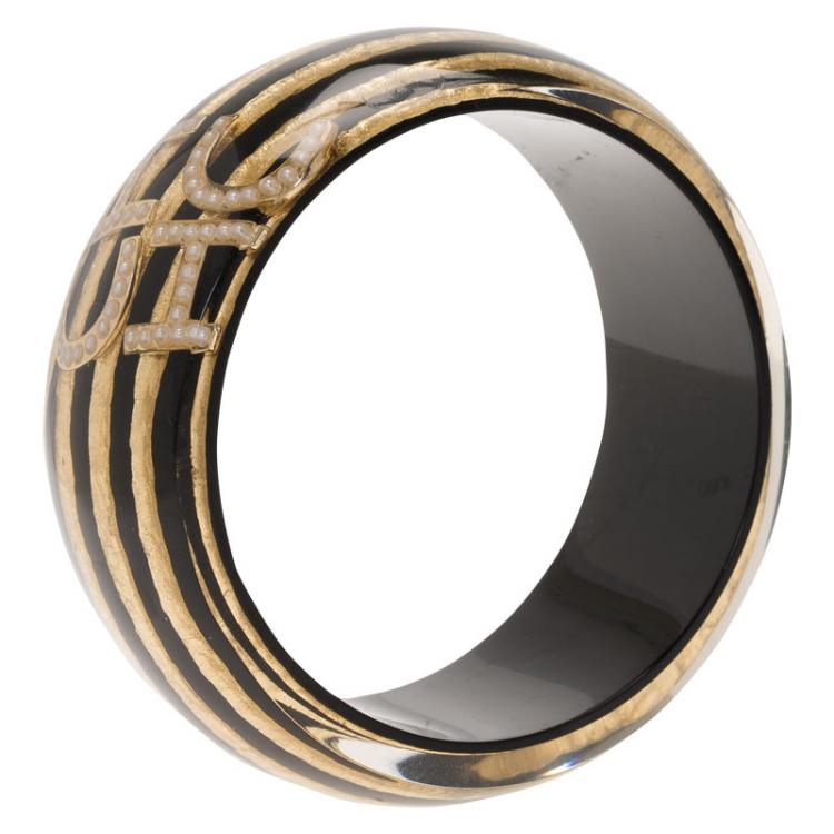 Pre Owned CH Carolina Herrera Faux Pearl Black and Gold Tone Resin Wide Bangle 20cm