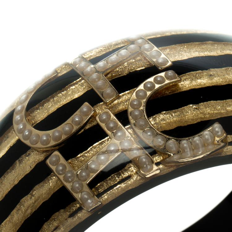 Pre Owned CH Carolina Herrera Gold Tone Inclusion Black Resin Wide Bangle Bracelet