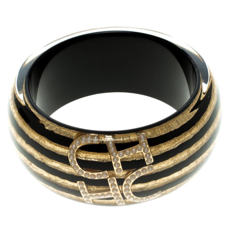 Pre Owned CH Carolina Herrera Gold Tone Inclusion Black Resin Wide Bangle Bracelet