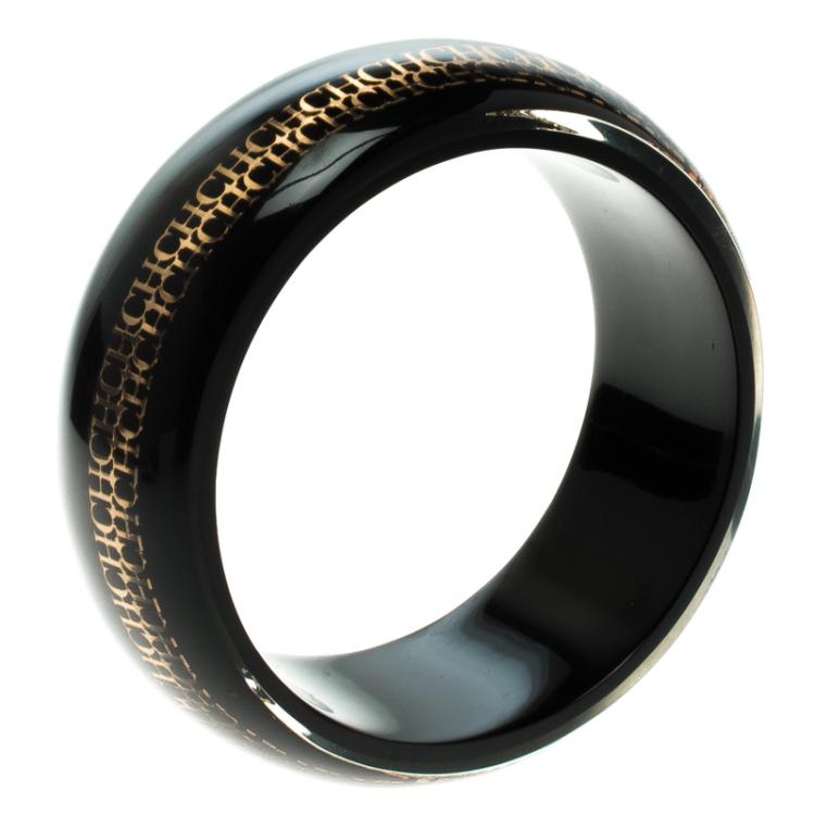 Pre Owned CH Carolina Herrera Black Resin Gold Tone Metal Wide Bangle Bracelet 22cm