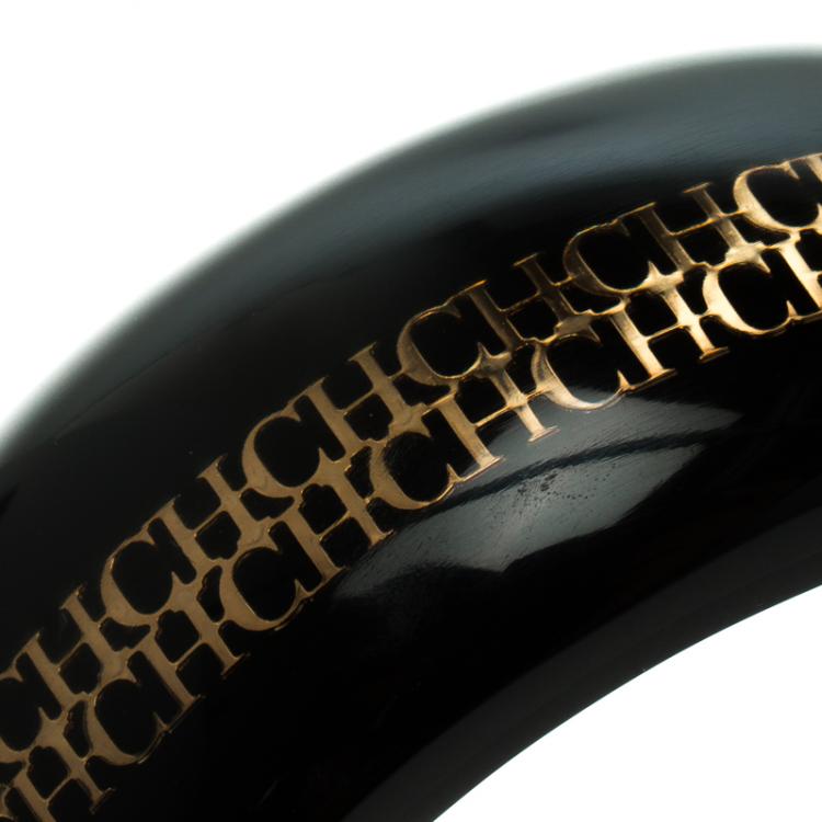 Pre Owned CH Carolina Herrera Black Resin Gold Tone Metal Wide Bangle Bracelet 22cm