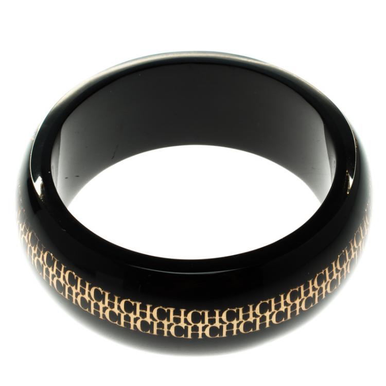 Pre Owned CH Carolina Herrera Black Resin Gold Tone Metal Wide Bangle Bracelet 22cm