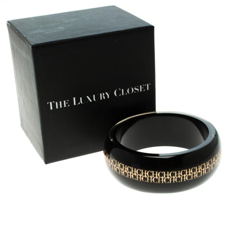 Pre Owned CH Carolina Herrera Black Resin Gold Tone Metal Wide Bangle Bracelet 22cm