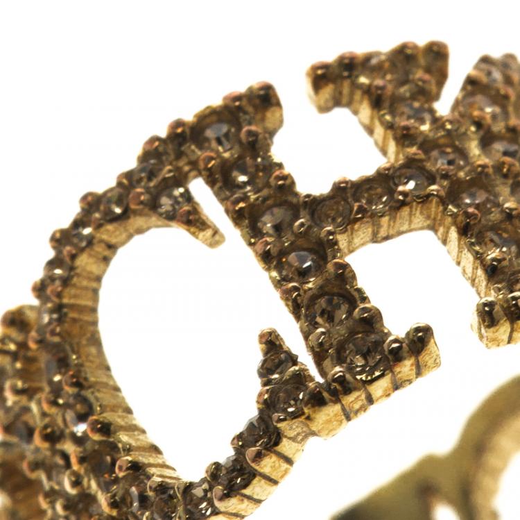 Pre Owned Carolina Herrera Crystal Studded Logo Gold Tone Ring Size 56