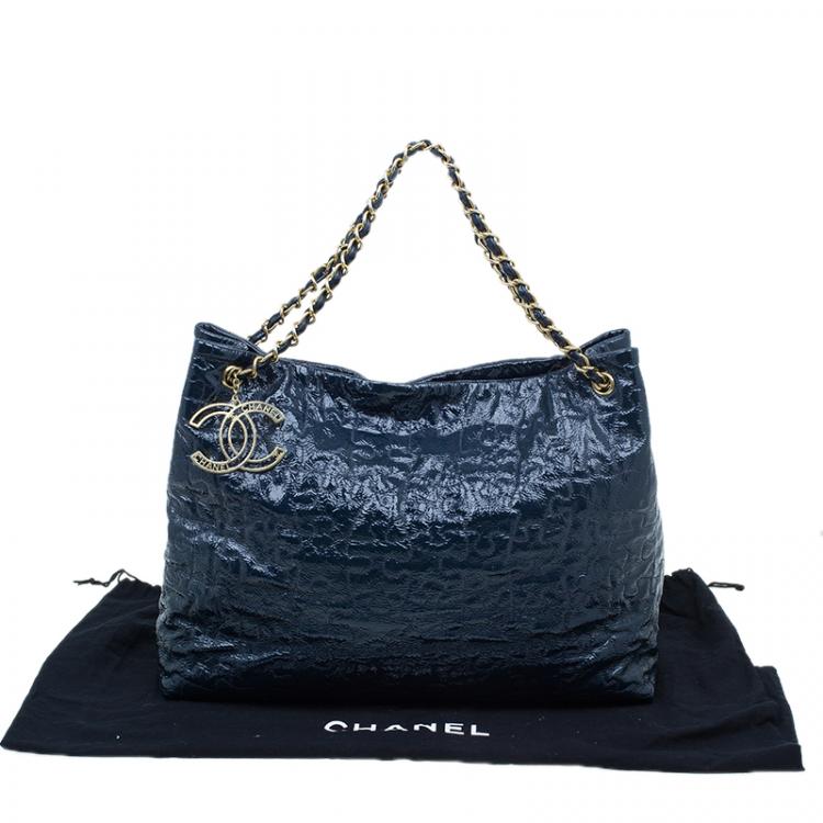 navy blue patent leather handbag