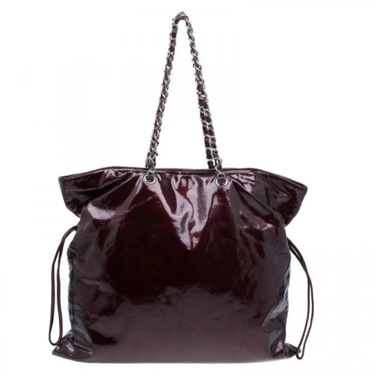 burgundy patent leather handbag