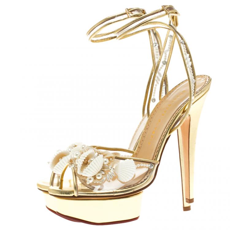 Pre Owned Charlotte Olympia Gold Leather and PVC She Sells Sea Shells Ankle Wrap Platform Sandals Size 39