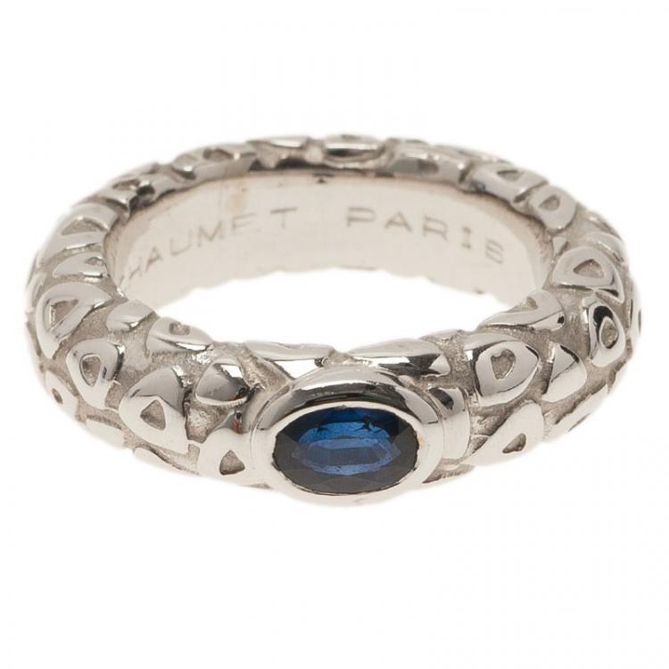 Pre Owned Chaumet Blue Sapphire Embossed White Gold Band Ring Size 54.5