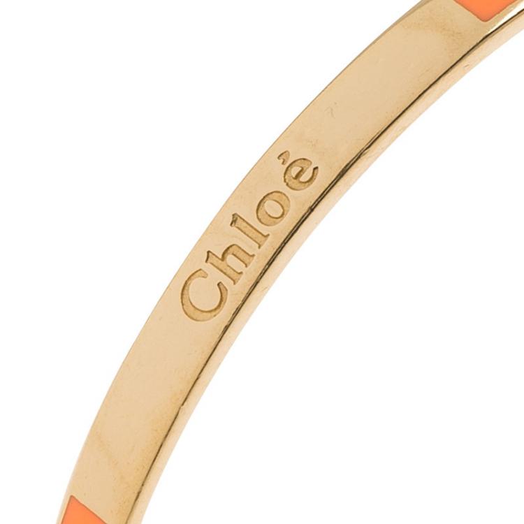 Pre Owned Chloe Holly Cream Enamel Gold Tone Narrow Bangle Bracelet