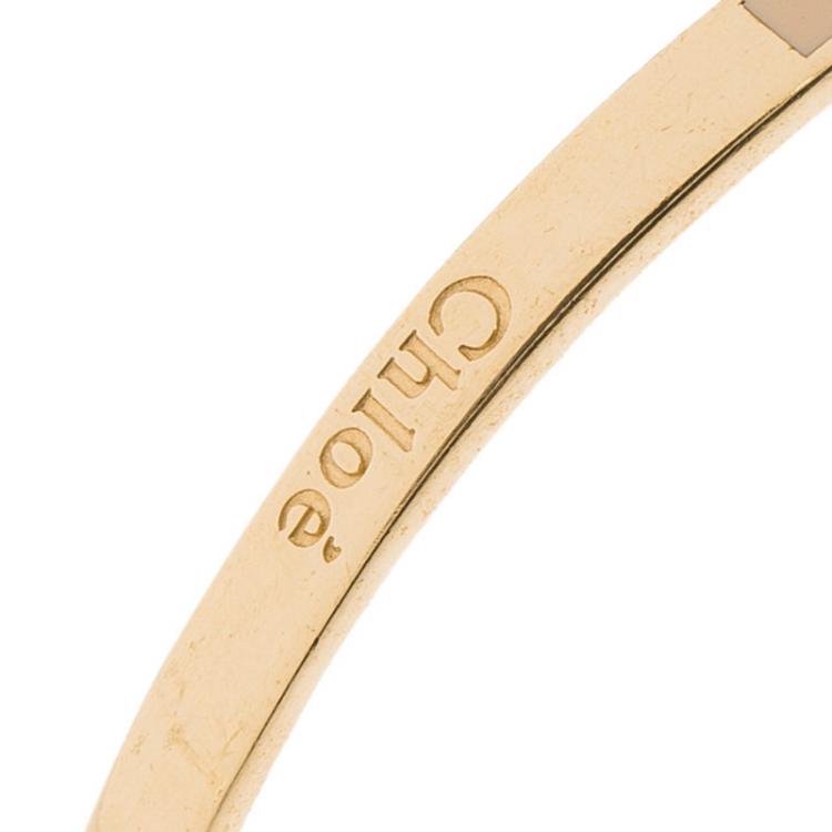 Pre Owned Chloe Holly Fluo Coral Enamel Gold Tone Narrow Bangle Bracelet