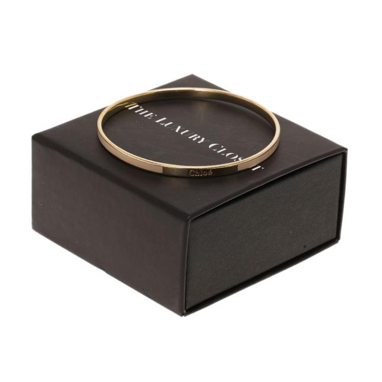 Pre Owned Chloe Holly Fluo Coral Enamel Gold Tone Narrow Bangle Bracelet