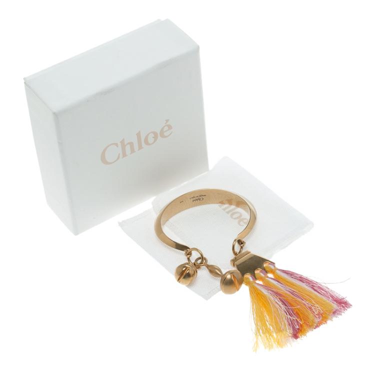 Pre Owned Chloe Janis Pastel Pink Fringe & Gold Tone Open Cuff Bracelet S