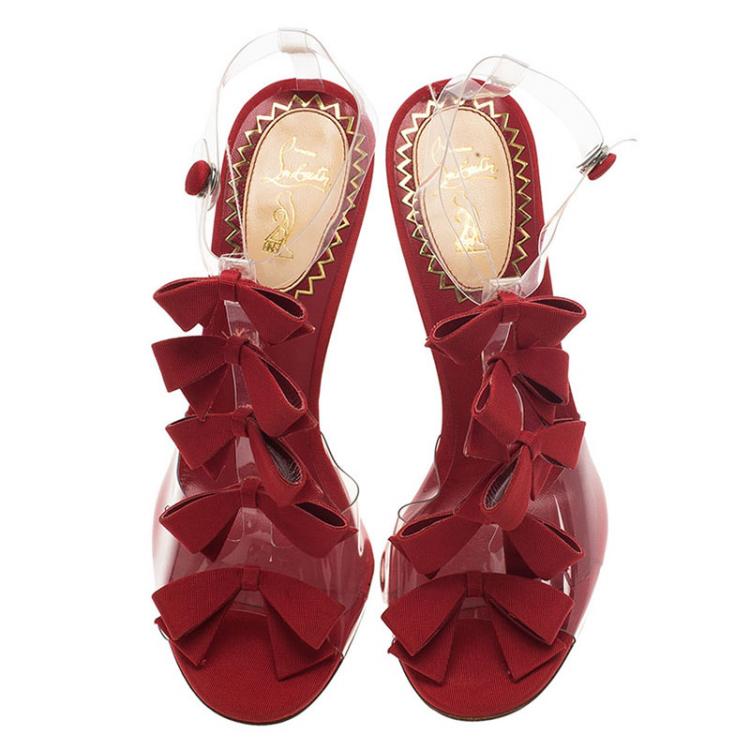 مملوكة مسبقًا Christian Louboutin Red Satin and PVC Bow Bow Slingback Sandals Size 39