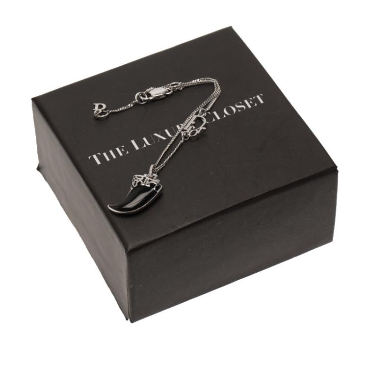 Pre Owned Dior Enamel Tooth Charm Silver Tone Bracelet