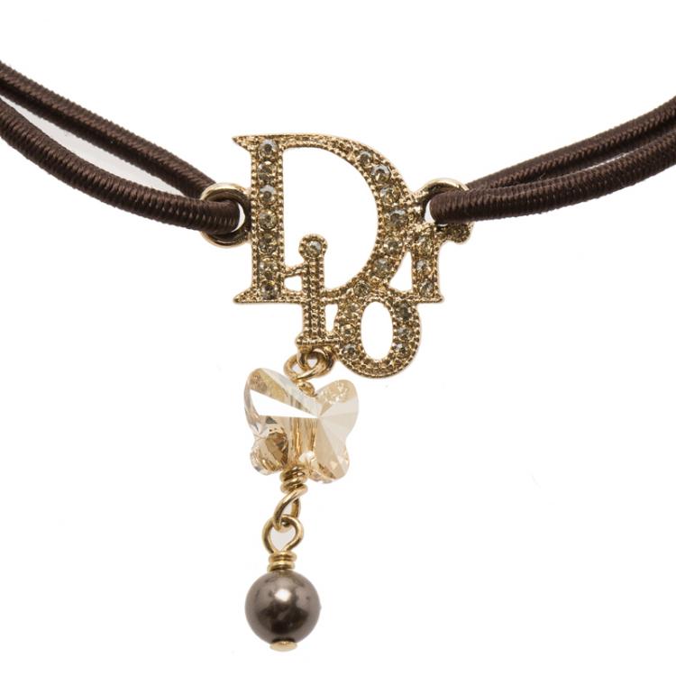 Pre Owned Dior Logo Crystal Gold Tone Brown Stretchable Cord Bracelet