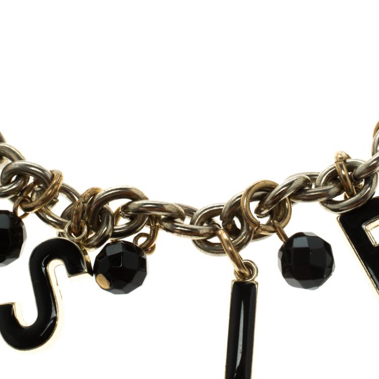 Pre Owned Dolce and Gabbana Desire Charm Enamel Gold Tone Bracelet