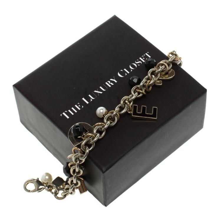 Pre Owned Dolce and Gabbana Desire Charm Enamel Gold Tone Bracelet
