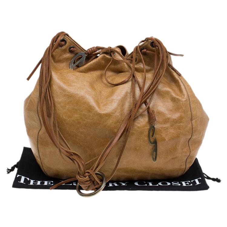 مملوكة مسبقًا Dolce and Gabbana Brown Leather Fringe Charm Bucket Hobo
