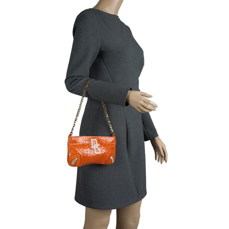 Pre Owned Dolce and Gabbana Orange Python Crystal Logo Chain Clutch
