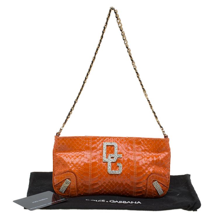 Pre Owned Dolce and Gabbana Orange Python Crystal Logo Chain Clutch