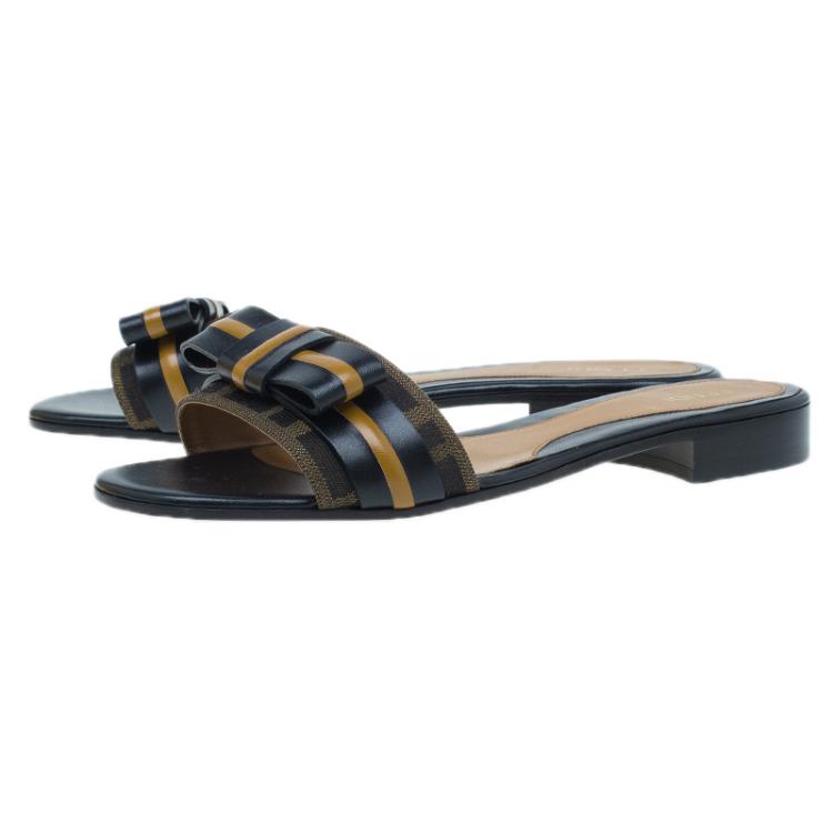 Pre Owned Fendi Tobacco Zucca Canvas and Leather Pride and Prejudice Bow Flat Slides Size 38