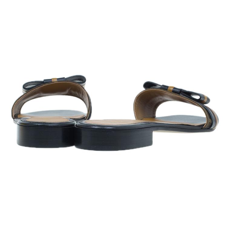 Pre Owned Fendi Tobacco Zucca Canvas and Leather Pride and Prejudice Bow Flat Slides Size 38