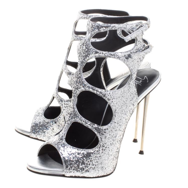 Pre Owned Giuseppe Zanotti Silver Glitter Cutout Ankle Strap Sandals Size 38.5