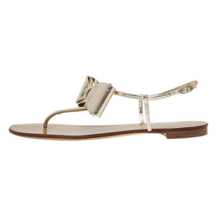 Pre Owned Giuseppe Zanotti Metallic Gold Leather Bow Thong Sandals Size 39