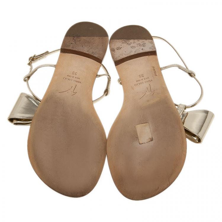 Pre Owned Giuseppe Zanotti Metallic Gold Leather Bow Thong Sandals Size 39