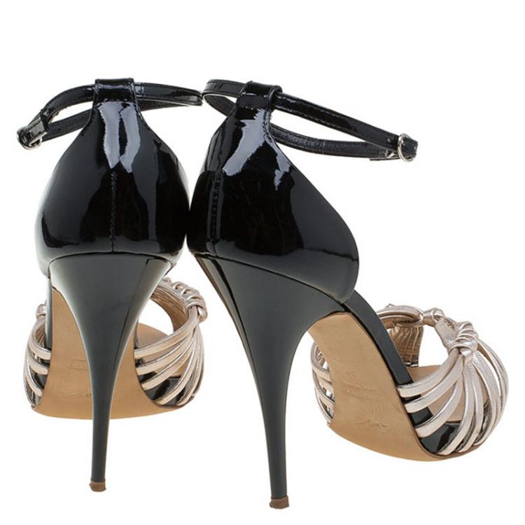 Pre Owned Giuseppe Zanotti Black and Gold Knotted Leather Ankle Strap Sandals Size 39