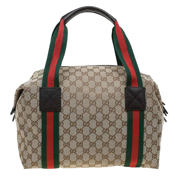 مملوكة مسبقًا Gucci Beige GG Canvas Carry On Web Duffel Bag