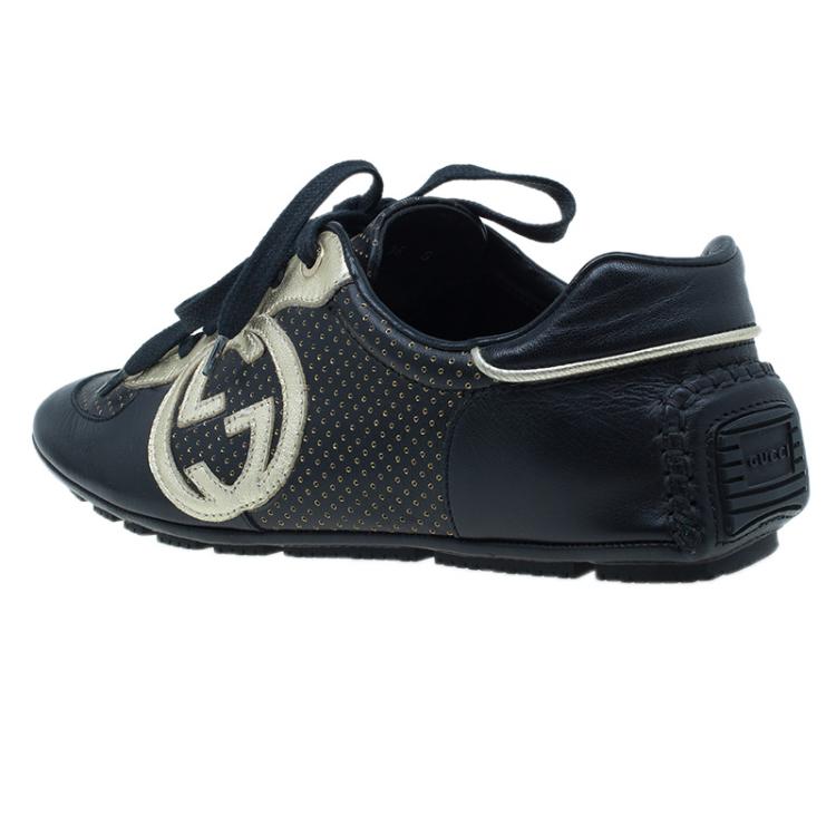 Pre Owned Gucci Black and Gold Leather Logo Sneakers Size 36