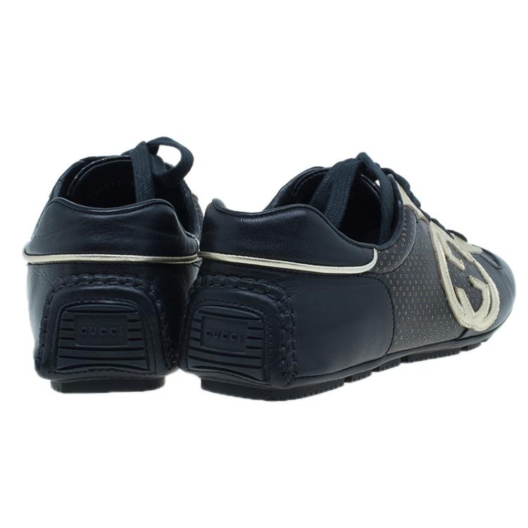 Pre Owned Gucci Black and Gold Leather Logo Sneakers Size 36