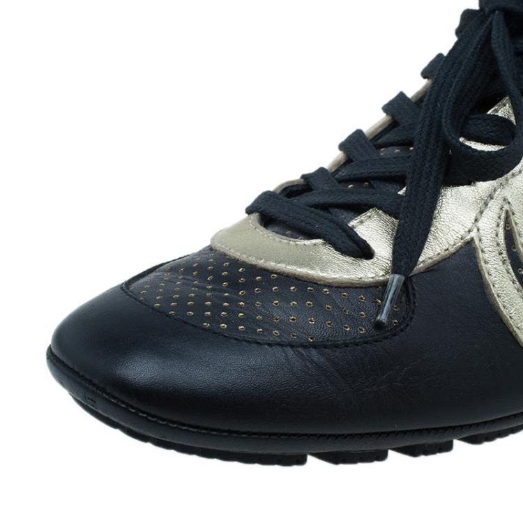 Pre Owned Gucci Black and Gold Leather Logo Sneakers Size 36