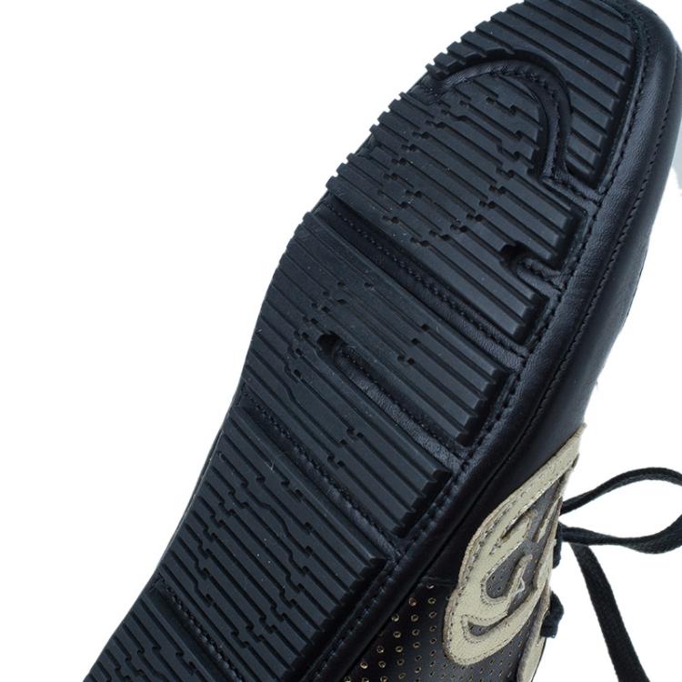 Pre Owned Gucci Black and Gold Leather Logo Sneakers Size 36