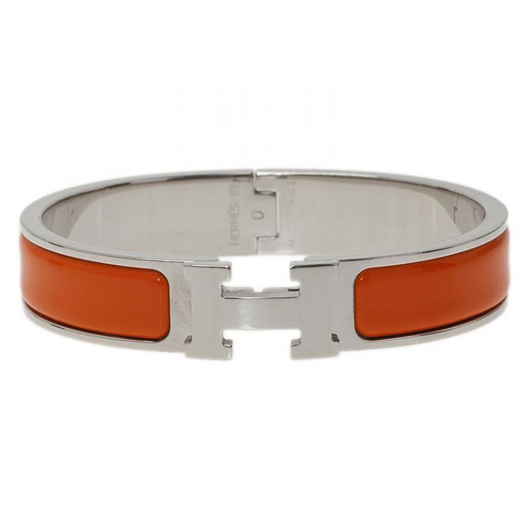 Pre Owned Hermes Clic Clac H Orange Enamel Palladium Plated Bracelet