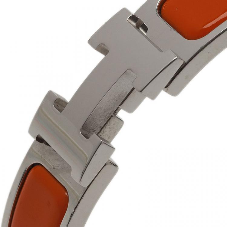 Pre Owned Hermes Clic Clac H Orange Enamel Palladium Plated Bracelet